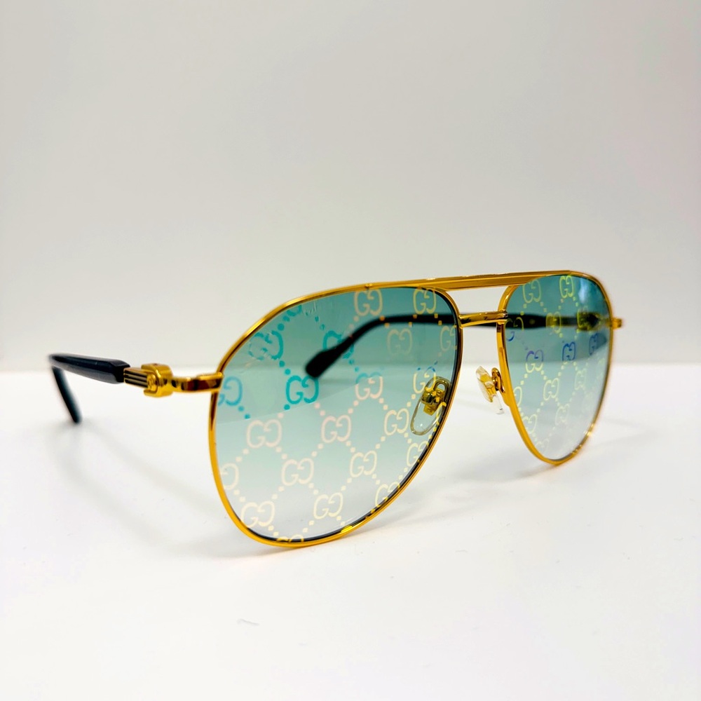 Gucci GG1220S 004 Gold Aviator With green Lens Gucci print
